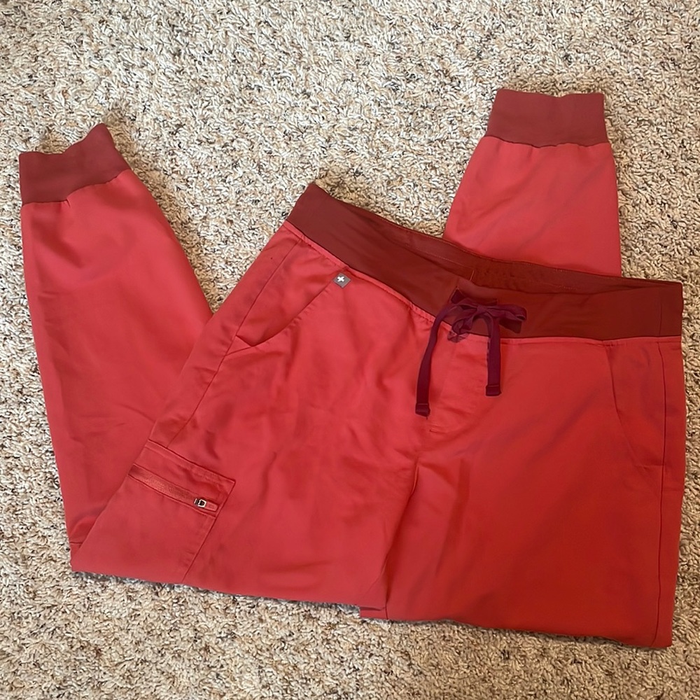 Red/ orange (sorry don’t know exact color) Zamora FIGS joggers